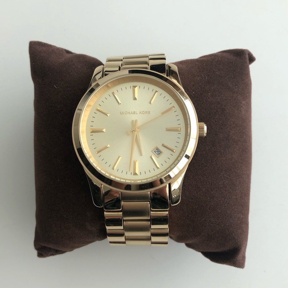 Michael Kors women’s oversized gold watch
